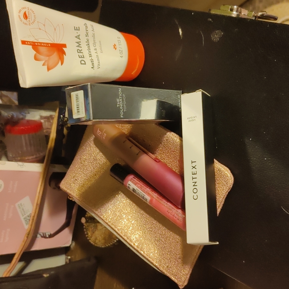 Pink makeup bag filled with makeup brand new